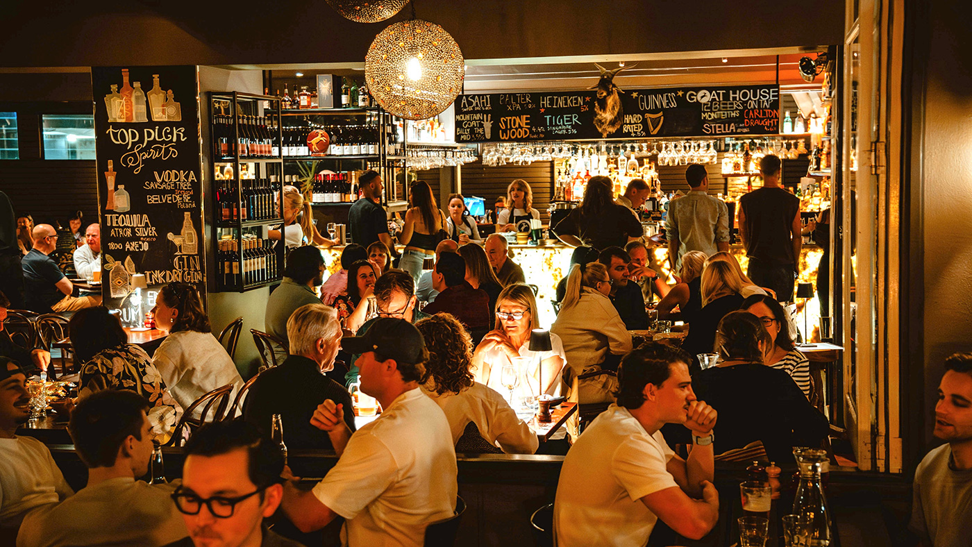 Lively evening atmosphere inside Goat House Restaurant