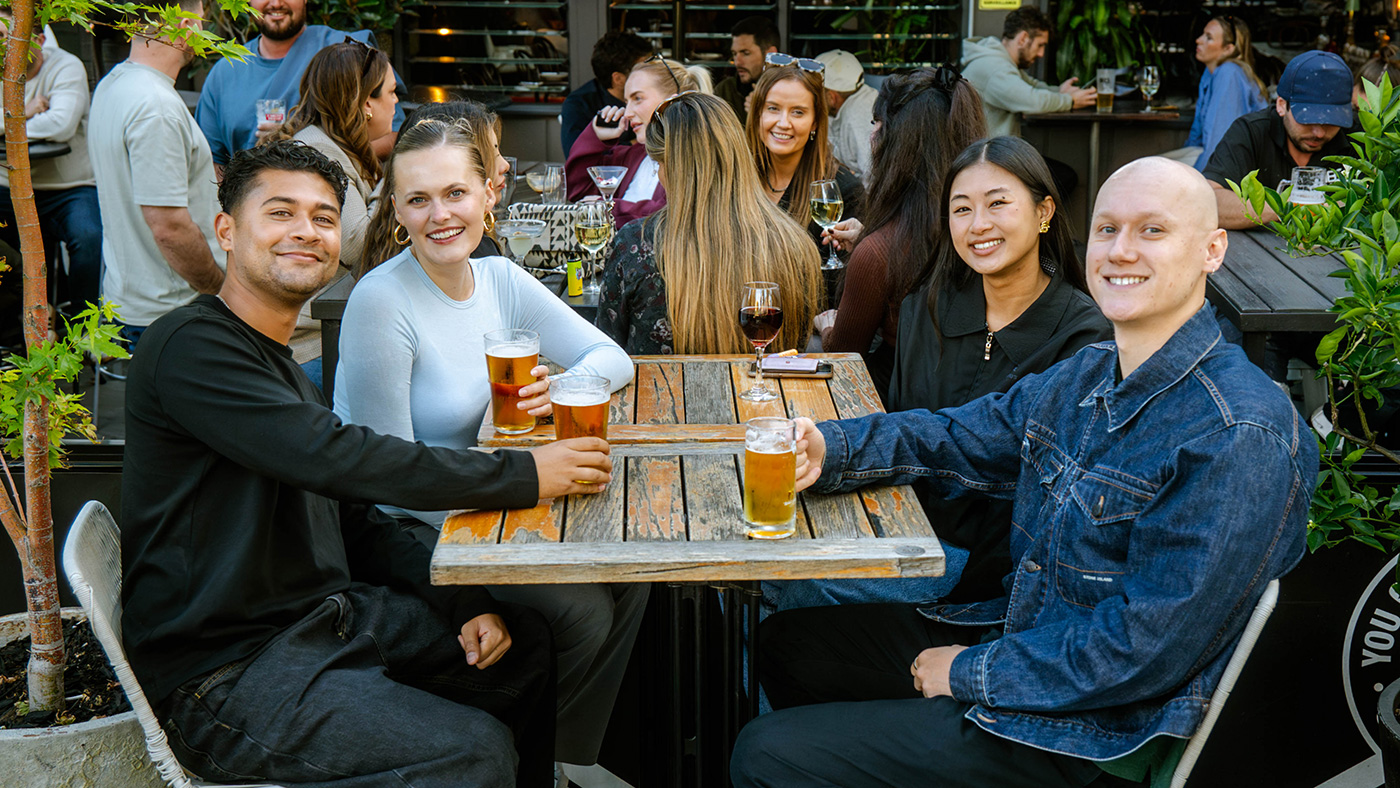 Friends enjoying outdoor dining at Goat House